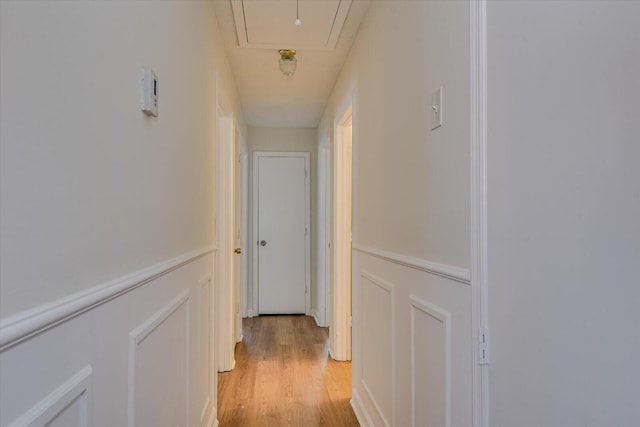 hallway featuring light hardwood / wood-style flooring