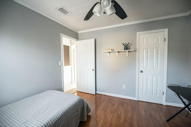 bedroom featuring hardwood / wood-style floors, ceiling fan, and ornamental molding