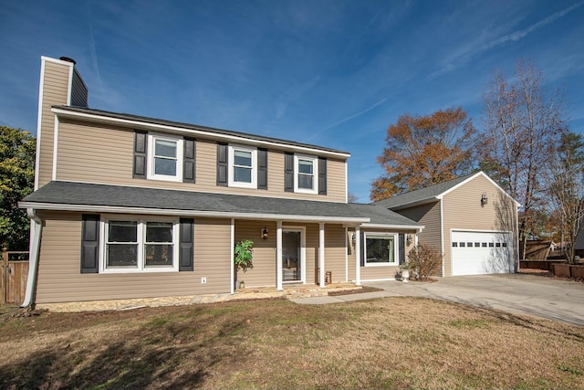 view of front facade with a front lawn and a garage