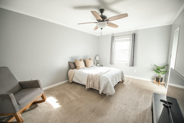 bedroom featuring light carpet, ceiling fan, and crown molding