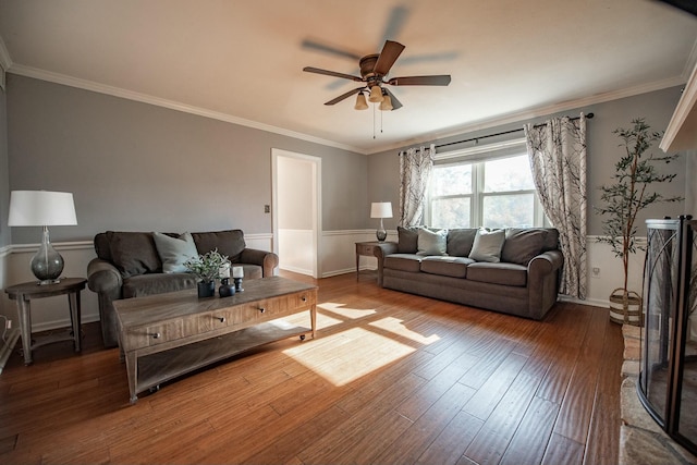 living room featuring ceiling fan, crown molding, and hardwood / wood-style floors