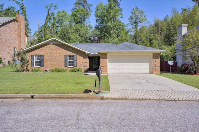 ranch-style house featuring a garage, concrete driveway, a front lawn, and brick siding