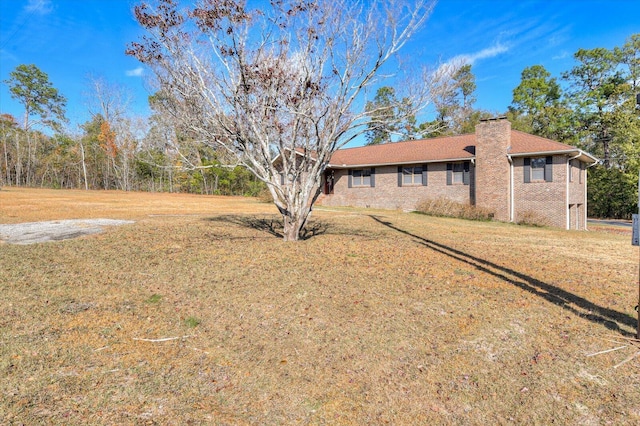 exterior space with a front lawn