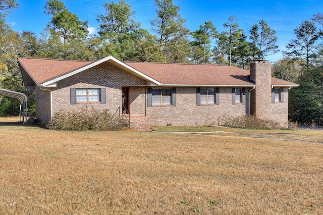 ranch-style home featuring a front lawn