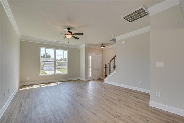 4062 Cottingham Way, Augusta, GA 30909 - unfurnished living room with light wood finished floors, ceiling fan, stairway, baseboards, and crown molding