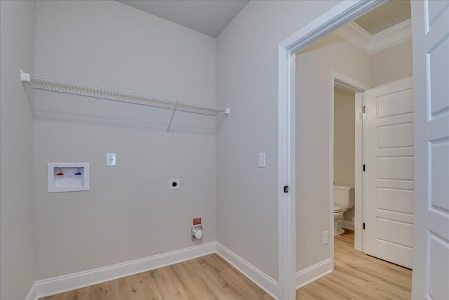 4062 Cottingham Way, Augusta, GA 30909 - laundry room featuring electric dryer hookup, light wood-type flooring, hookup for a washing machine, baseboards, and ornamental molding