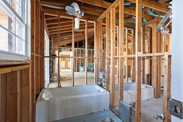 bathroom featuring a garden tub