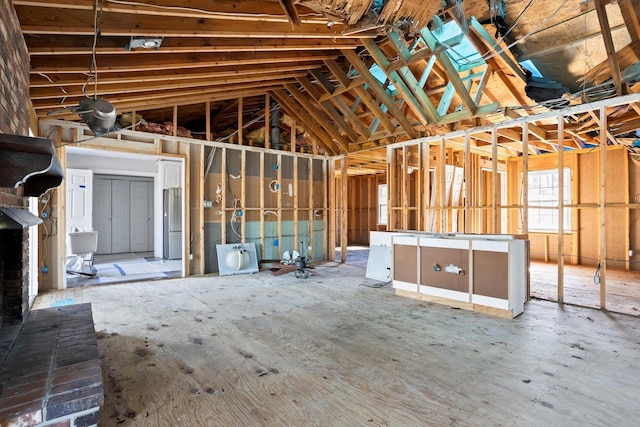 misc room featuring lofted ceiling