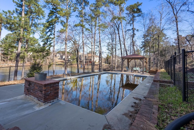 view of swimming pool featuring a fenced in pool, fence, a gazebo, and a patio