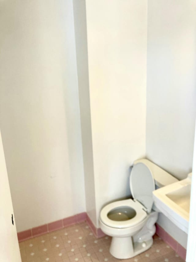 bathroom featuring toilet