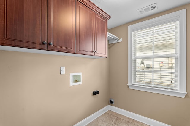 436 Sebastian Dr, Grovetown, GA 30813 - laundry room featuring hookup for a washing machine, cabinet space, hookup for an electric dryer, and light tile patterned flooring