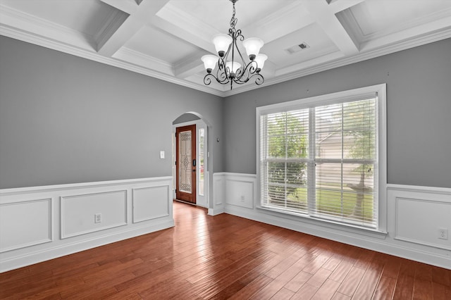 436 Sebastian Dr, Grovetown, GA 30813 - empty room with arched walkways, coffered ceiling, a chandelier, wainscoting, and beam ceiling