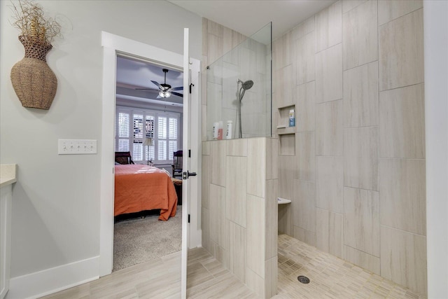 ensuite bathroom featuring a ceiling fan, ensuite bath, and a walk in shower