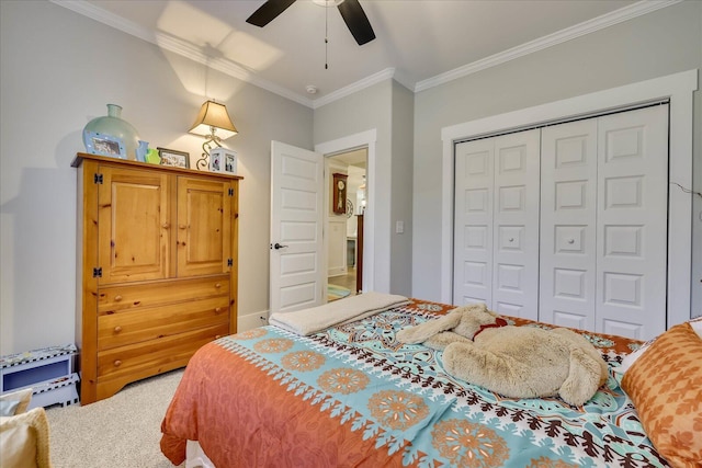 bedroom featuring ceiling fan, a closet, and ornamental molding