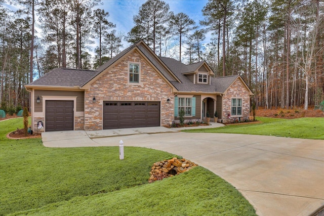 craftsman house with stone siding, concrete driveway, a front yard, and a shingled roof