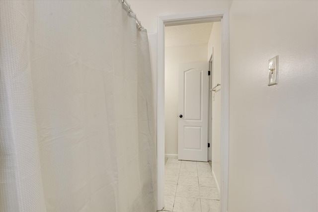 3647 N Madrid Dr, Augusta, GA 30906 - corridor featuring baseboards and light tile patterned floors
