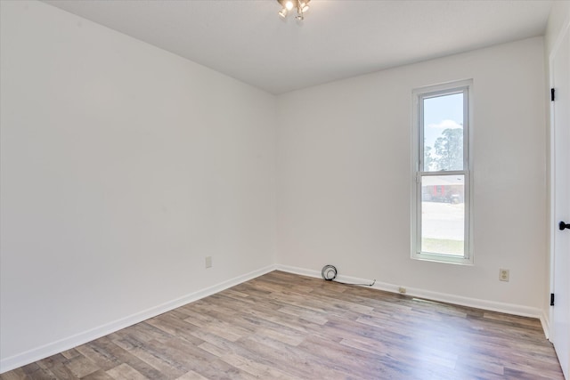 3647 N Madrid Dr, Augusta, GA 30906 - spare room with plenty of natural light, light wood-type flooring, and baseboards