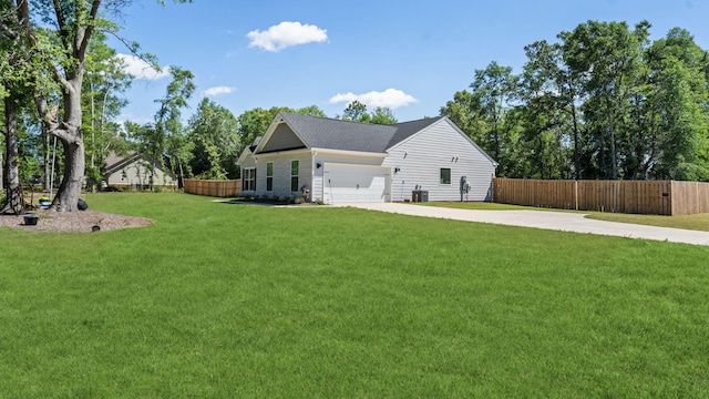 4756 Storey Mill Rd, Hephzibah, GA 30815 - view of side of home with concrete driveway, a garage, and central air condition unit