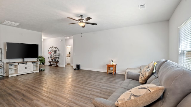 4756 Storey Mill Rd, Hephzibah, GA 30815 - living area featuring wood finished floors, ceiling fan, and baseboards