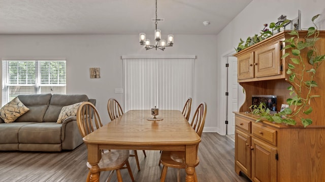 4756 Storey Mill Rd, Hephzibah, GA 30815 - dining space with a chandelier and light wood finished floors