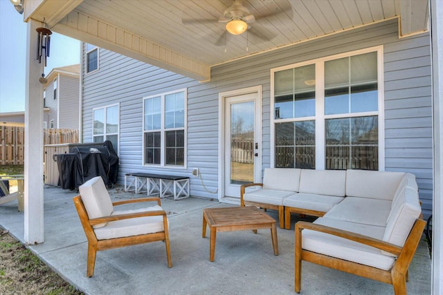 view of patio featuring outdoor lounge area, a grill, a ceiling fan, and fence