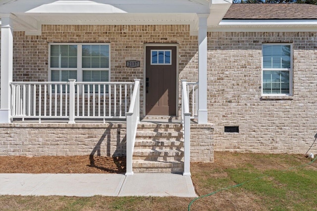 property entrance with a porch