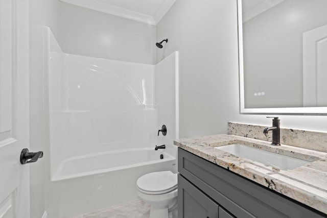 full bathroom featuring vanity, tub / shower combination, toilet, and crown molding