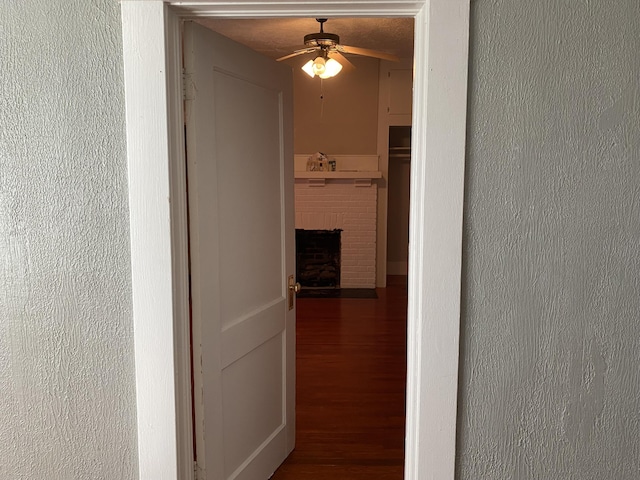 hallway with dark hardwood / wood-style floors