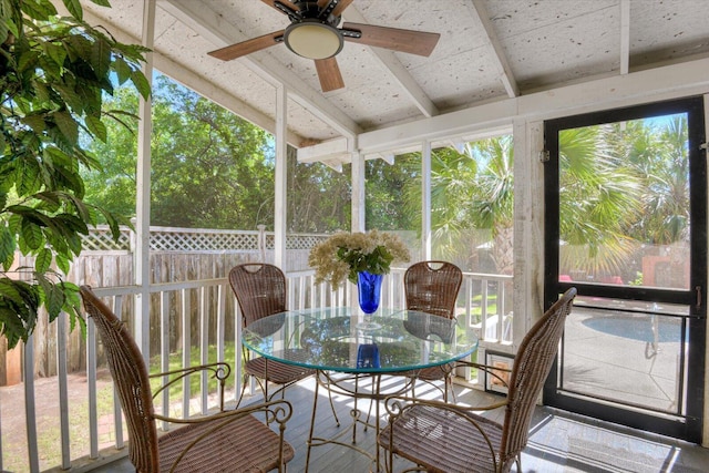 sunroom featuring a wealth of natural light and ceiling fan