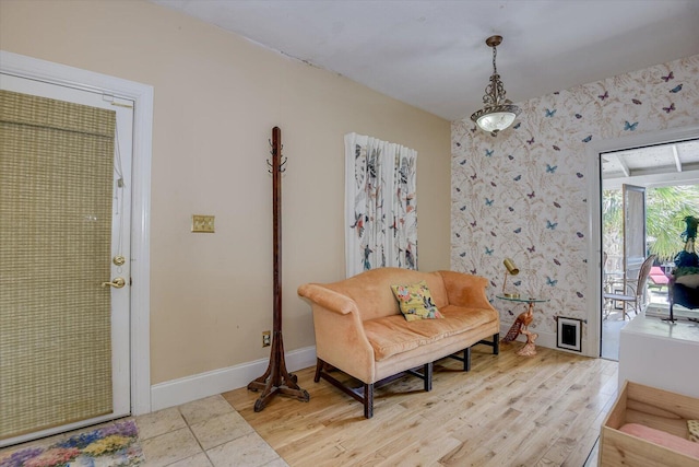 sitting room with light hardwood / wood-style flooring