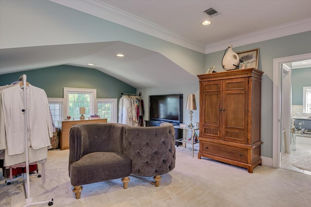 interior space featuring lofted ceiling, ornamental molding, and light carpet