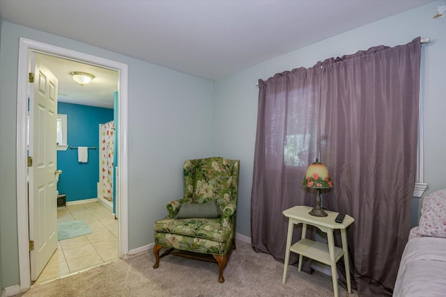 living area with light tile patterned floors