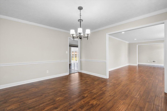 empty room featuring an inviting chandelier, baseboards, wood-type flooring, and ornamental molding