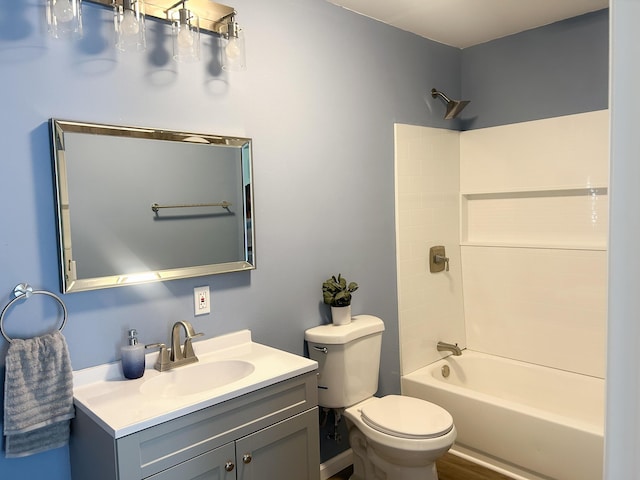 full bathroom featuring vanity,  shower combination, and toilet