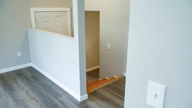 staircase featuring hardwood / wood-style floors