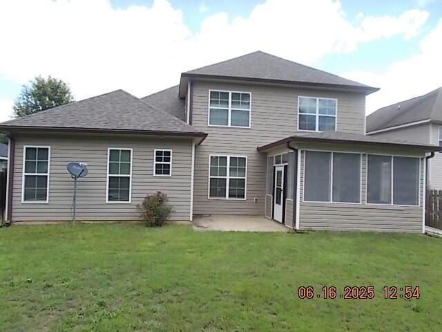 437 Sebastian Dr, Grovetown, GA 30813 - back of house featuring a patio, a lawn, and a sunroom