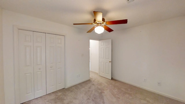 431 Connemara Trl, Evans, GA 30809 - unfurnished bedroom with light colored carpet, a closet, and a ceiling fan