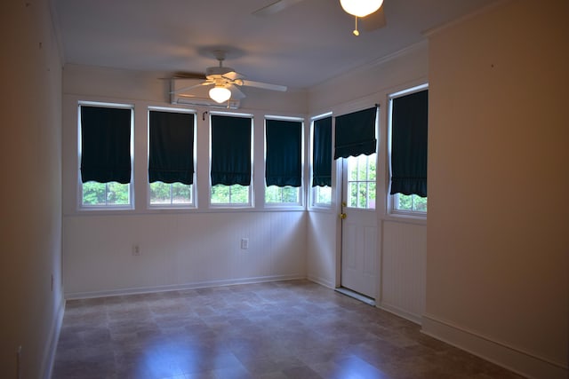 431 Connemara Trl, Evans, GA 30809 - unfurnished room with ceiling fan, plenty of natural light, crown molding, and tile patterned floors