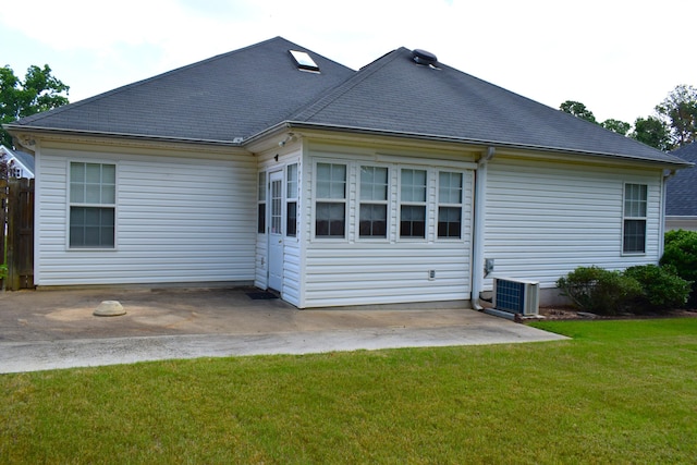 431 Connemara Trl, Evans, GA 30809 - back of house featuring a patio and a lawn