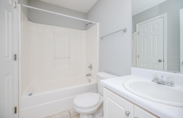 full bathroom featuring vanity, shower / washtub combination, tile patterned floors, and toilet