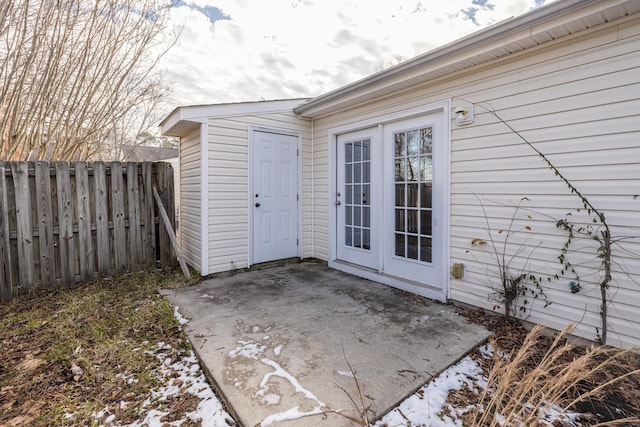 doorway to property with a patio area and french doors