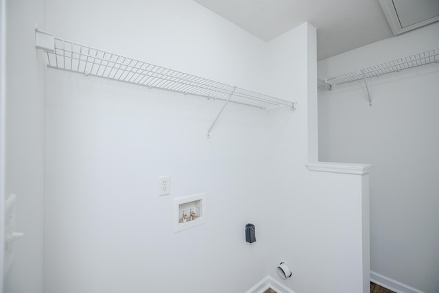 laundry area with washer hookup and hookup for an electric dryer