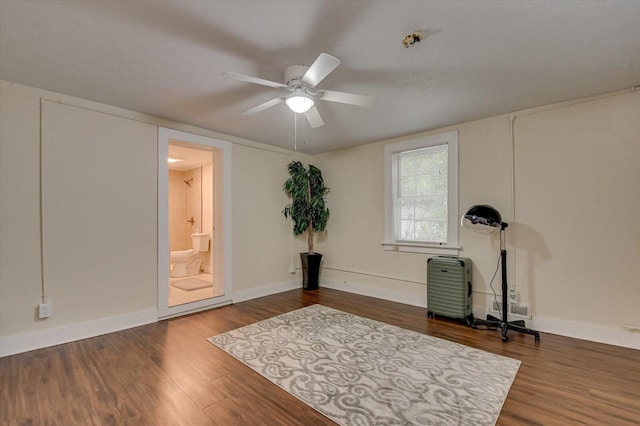 unfurnished room with hardwood / wood-style floors and ceiling fan