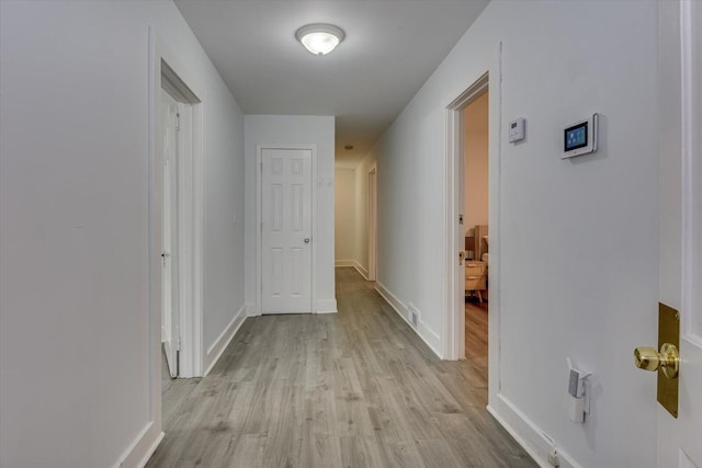 hall featuring light wood-type flooring