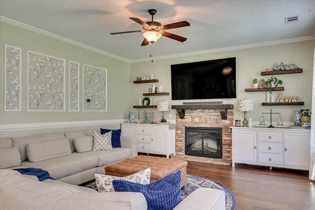 714 Neville St, Grovetown, GA 30813 - living area featuring crown molding, a ceiling fan, dark wood-style floors, bar with sink, and a fireplace