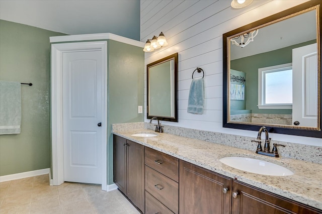 714 Neville St, Grovetown, GA 30813 - full bathroom with double vanity, tile patterned floors, and wood walls
