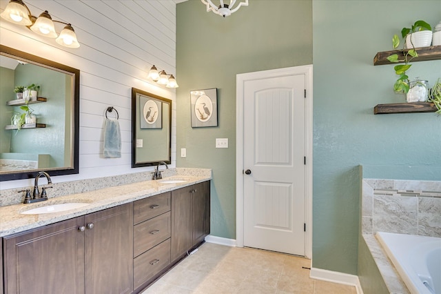 714 Neville St, Grovetown, GA 30813 - bathroom with tile patterned flooring, double vanity, a bath, and wooden walls