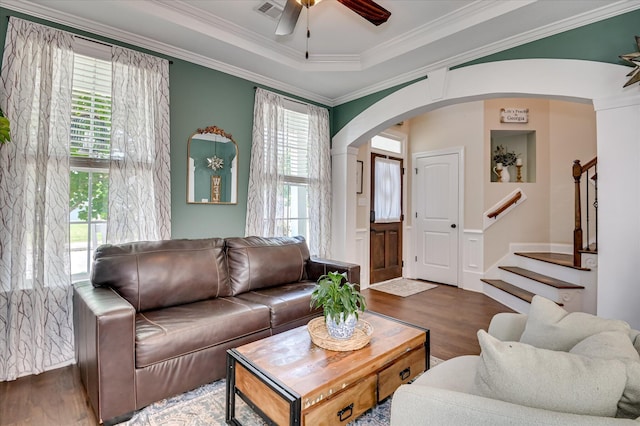 714 Neville St, Grovetown, GA 30813 - living room with arched walkways, wood finished floors, a ceiling fan, ornamental molding, and stairs