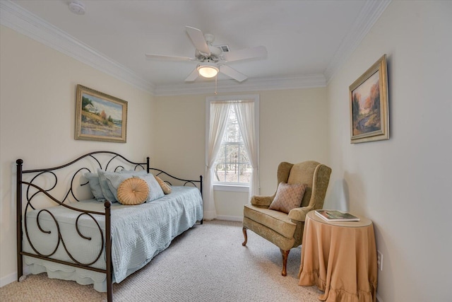 carpeted bedroom with ceiling fan and crown molding