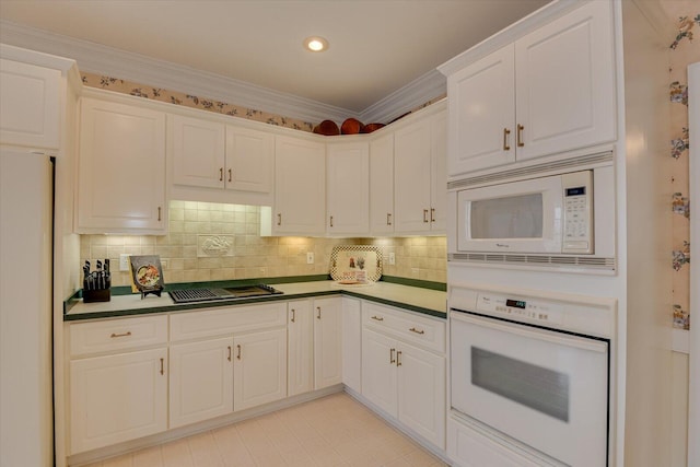 kitchen with decorative backsplash, white appliances, white cabinetry, and ornamental molding